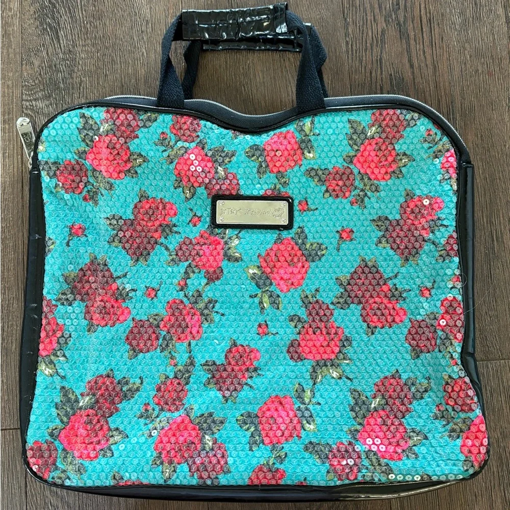 Betsey John turquoise and floral fully clear sequined bag.